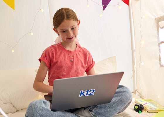 little girl using her computer