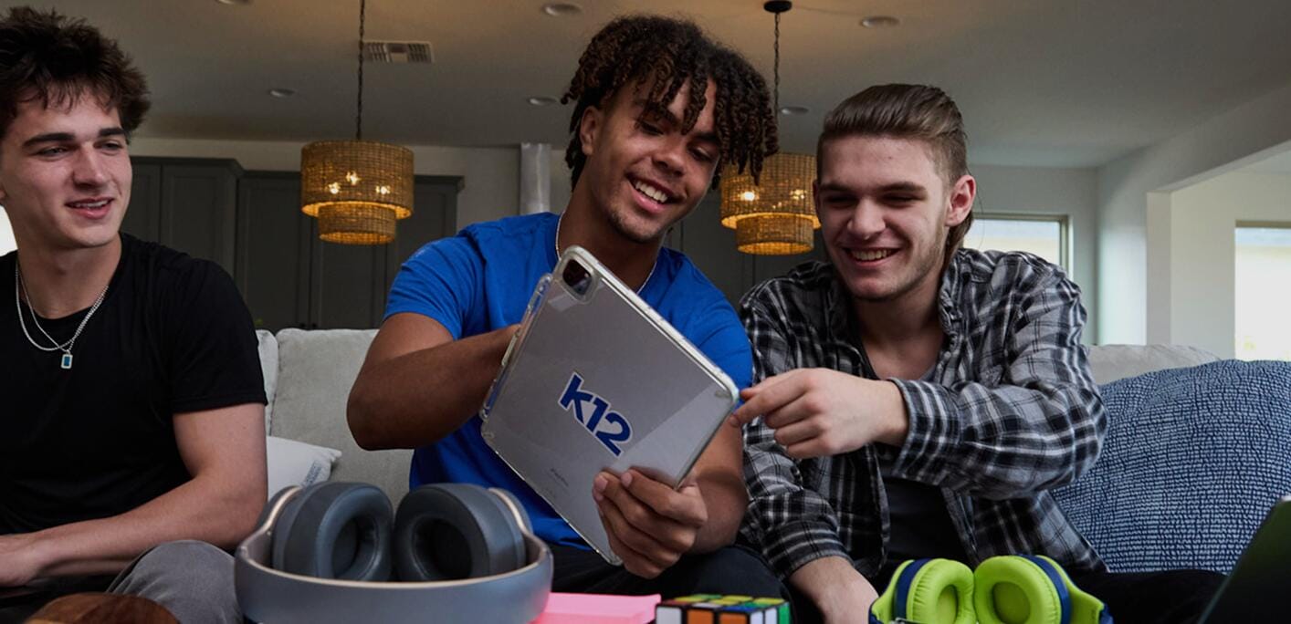 Students using their tablet