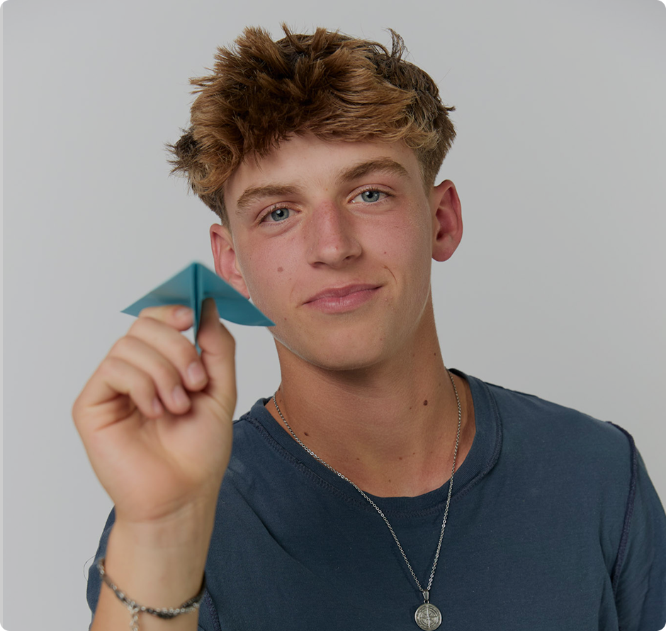 Student with a paper plane