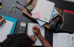 Student taking notes