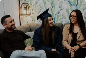 People sharing with a graduate
